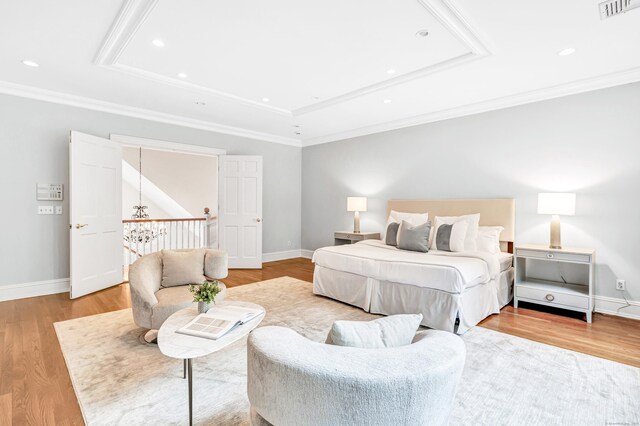 4 Lyons Plain Rd, Weston, CT 06883 - bedroom featuring attic access, light wood finished floors, a tray ceiling, recessed lighting, and crown molding
