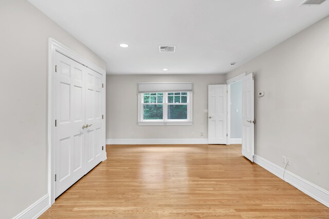 4 Lyons Plain Rd, Weston, CT 06883 - unfurnished bedroom featuring light wood-style floors, recessed lighting, and a closet