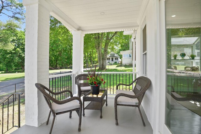 26 Mary St, Shelton, CT 06484 - covered porch with a lawn