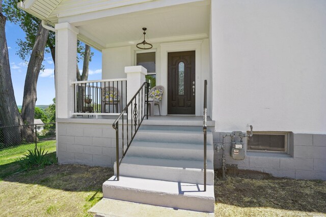 26 Mary St, Shelton, CT 06484 - view of exterior entry with a porch and stucco siding