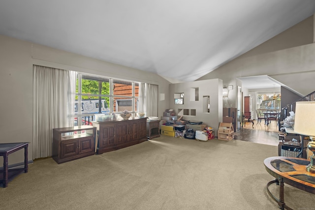 337 Woodbine Rd, Stamford, CT 06903 - sitting room featuring vaulted ceiling, carpet, and a chandelier