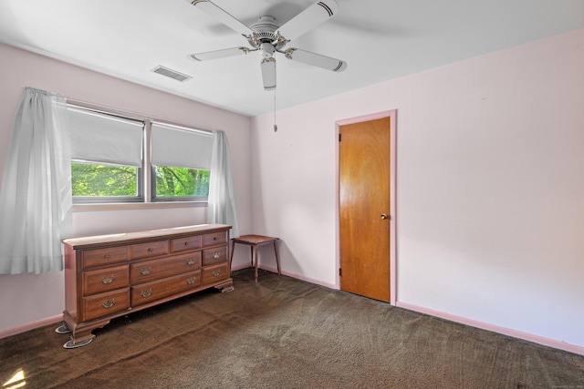 337 Woodbine Rd, Stamford, CT 06903 - bedroom with dark carpet, baseboards, and a ceiling fan