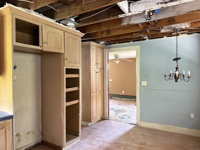 34 Buckingham Ave, Norwich, CT 06360 - kitchen featuring light brown cabinetry, a ceiling fan, and a chandelier