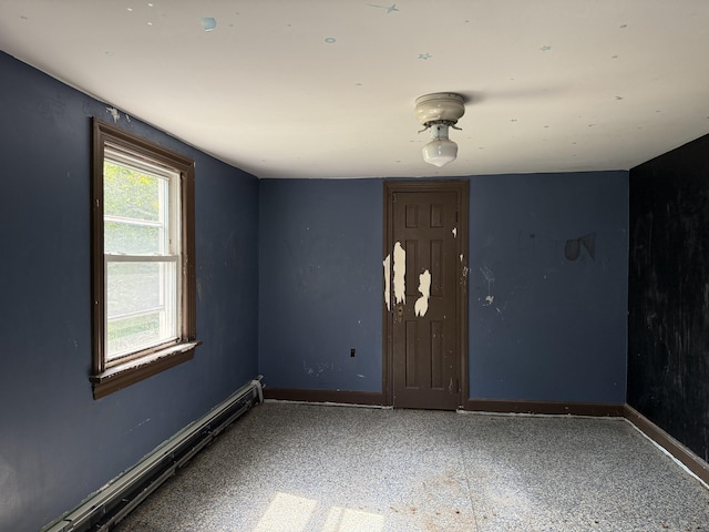 34 Buckingham Ave, Norwich, CT 06360 - spare room with a baseboard heating unit and baseboards