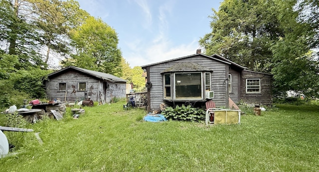 70 E Hill Rd, Canton, CT 06019 - rear view of house with a lawn