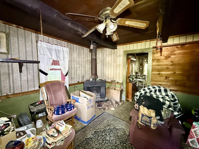 70 E Hill Rd, Canton, CT 06019 - carpeted living room featuring ceiling fan and a wood stove