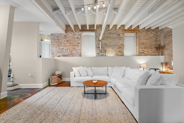 43 Chestnut St Unit 60, New Haven, CT 06511 - living room with baseboards, beam ceiling, and brick wall