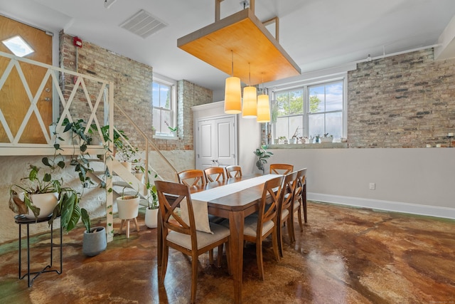43 Chestnut St Unit 60, New Haven, CT 06511 - dining area featuring concrete floors and plenty of natural light