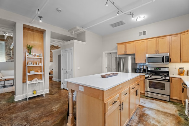 43 Chestnut St Unit 60, New Haven, CT 06511 - kitchen featuring stainless steel appliances, concrete floors, light brown cabinets, light countertops, and a kitchen island