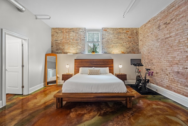 43 Chestnut St Unit 60, New Haven, CT 06511 - bedroom with brick wall, baseboards, and finished concrete flooring