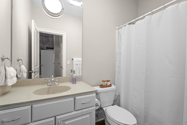 43 Chestnut St Unit 60, New Haven, CT 06511 - bathroom featuring vanity, toilet, and a shower with shower curtain