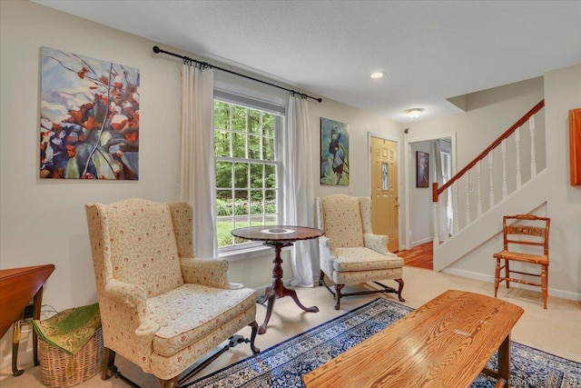19 Oak Leaf Cir, Coventry, CT 06238 - sitting room with stairway, carpet, baseboards, and recessed lighting