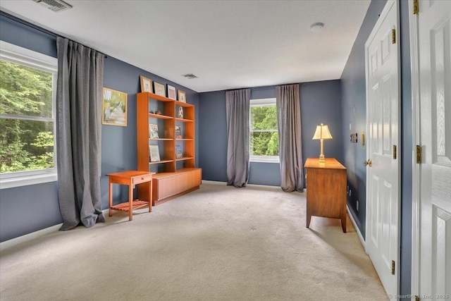 19 Oak Leaf Cir, Coventry, CT 06238 - living area with carpet flooring and baseboards