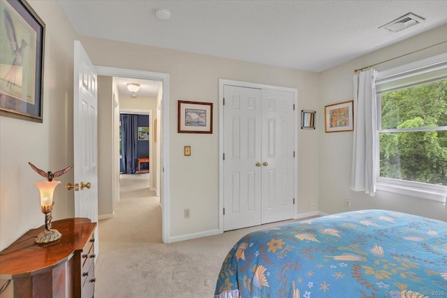 19 Oak Leaf Cir, Coventry, CT 06238 - bedroom with light colored carpet, baseboards, and a closet