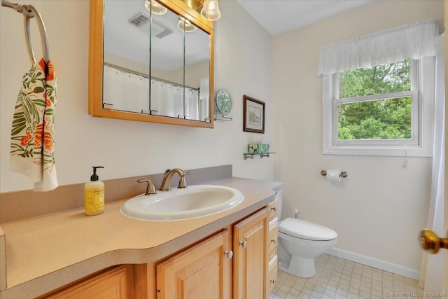 19 Oak Leaf Cir, Coventry, CT 06238 - bathroom featuring vanity, toilet, tile patterned flooring, and baseboards