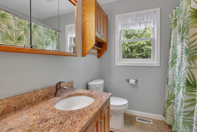 19 Oak Leaf Cir, Coventry, CT 06238 - full bathroom featuring toilet, vanity, baseboards, a shower with shower curtain, and tile patterned flooring