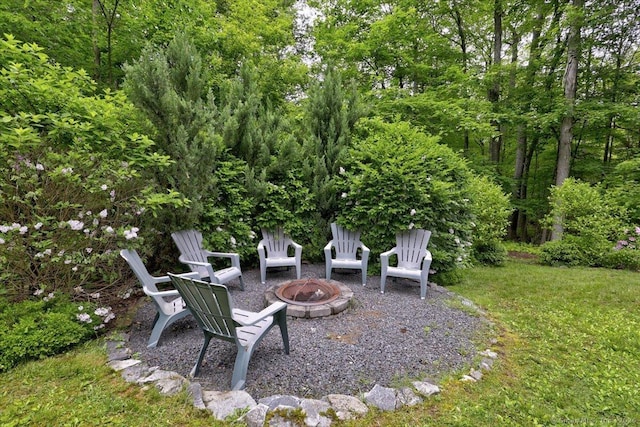 19 Oak Leaf Cir, Coventry, CT 06238 - view of green lawn featuring a fire pit