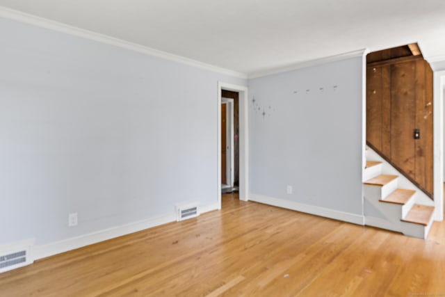 54 Briarwood Rd, Newington, CT 06111 - spare room with ornamental molding, wood finished floors, and baseboards