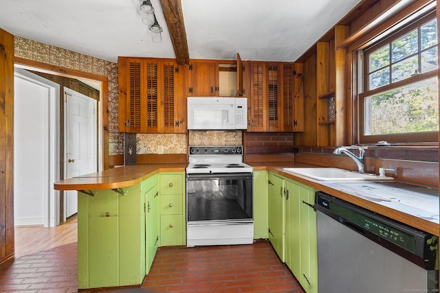 54 Briarwood Rd, Newington, CT 06111 - kitchen featuring white appliances, a sink, green cabinetry, and a peninsula
