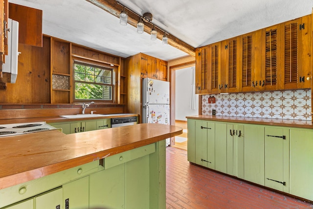 54 Briarwood Rd, Newington, CT 06111 - kitchen featuring freestanding refrigerator, green cabinets, open shelves, beam ceiling, and brick floors