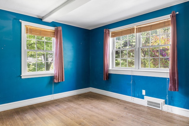 54 Briarwood Rd, Newington, CT 06111 - empty room with beam ceiling, baseboards, and wood finished floors