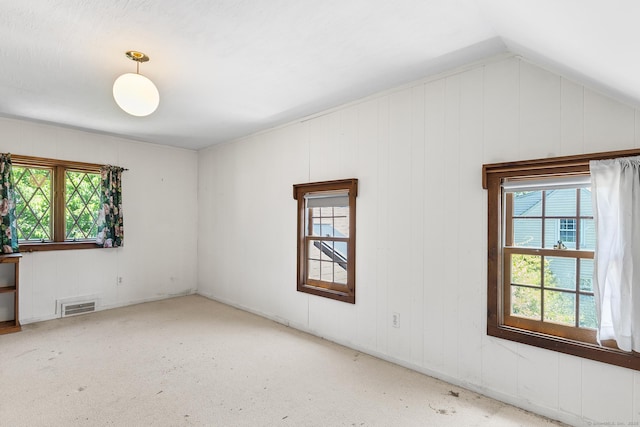 54 Briarwood Rd, Newington, CT 06111 - carpeted spare room with plenty of natural light and vaulted ceiling