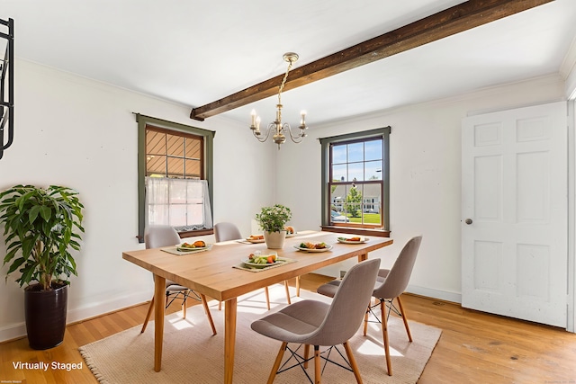 54 Briarwood Rd, Newington, CT 06111 - dining area featuring a chandelier, light wood finished floors, beam ceiling, ornamental molding, and baseboards