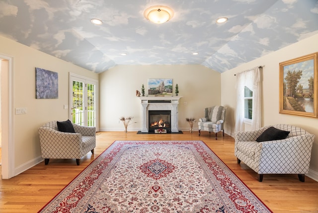 3 Autumn Ridge Rd, Newtown, CT 06470 - living room featuring lofted ceiling, light wood-style floors, a high end fireplace, baseboards, and recessed lighting
