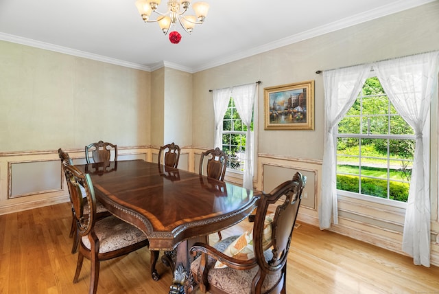 3 Autumn Ridge Rd, Newtown, CT 06470 - dining room featuring a chandelier, light wood finished floors, wainscoting, and ornamental molding
