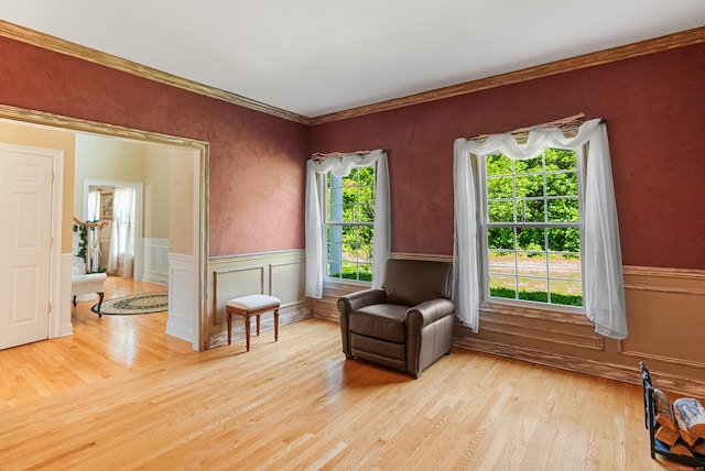 3 Autumn Ridge Rd, Newtown, CT 06470 - sitting room with light wood-style flooring, wainscoting, and ornamental molding
