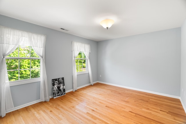 3 Autumn Ridge Rd, Newtown, CT 06470 - empty room with wood finished floors and baseboards