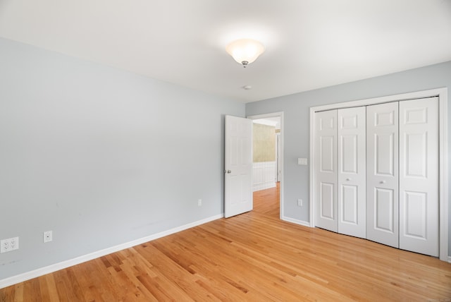 3 Autumn Ridge Rd, Newtown, CT 06470 - unfurnished bedroom featuring light wood-style flooring, baseboards, and a closet