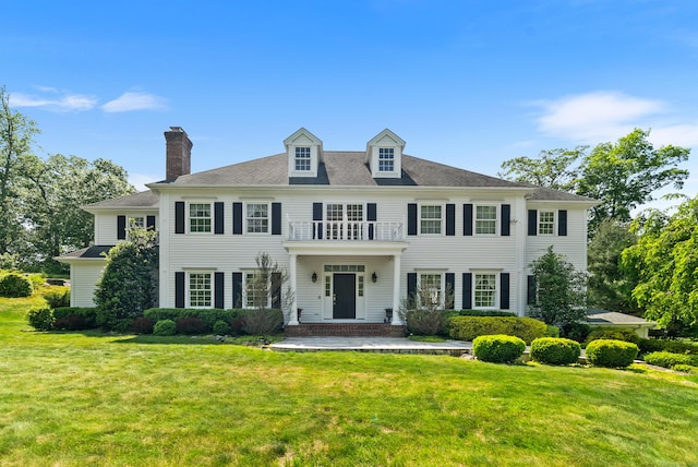 3 Autumn Ridge Rd, Newtown, CT 06470 - colonial house featuring a front yard and a chimney