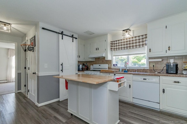 59 Valley Dr, Berlin, CT 06037 - kitchen with white appliances, wood counters, under cabinet range hood, a sink, and a barn door