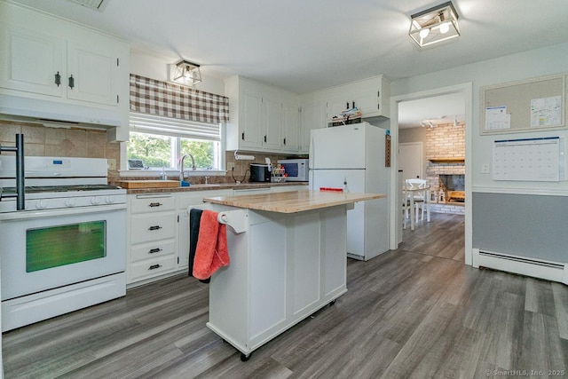 59 Valley Dr, Berlin, CT 06037 - kitchen featuring white appliances, under cabinet range hood, white cabinets, and a baseboard heating unit
