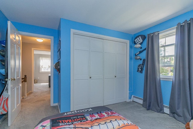 59 Valley Dr, Berlin, CT 06037 - carpeted bedroom with a closet, baseboards, and a baseboard radiator