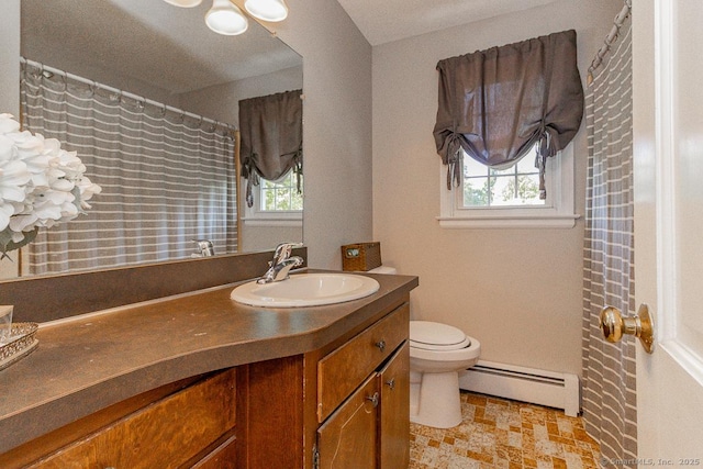 59 Valley Dr, Berlin, CT 06037 - bathroom featuring a baseboard radiator, vanity, healthy amount of natural light, and toilet