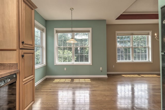 35 Todd St Unit 204, Hamden, CT 06518 - unfurnished dining area with wood-type flooring and baseboards