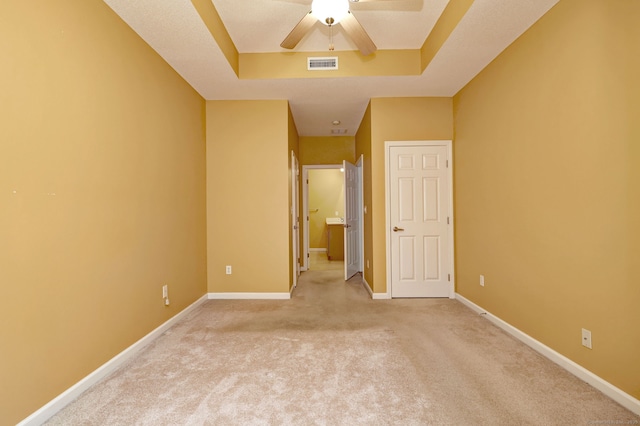 35 Todd St Unit 204, Hamden, CT 06518 - unfurnished bedroom with light colored carpet, baseboards, a raised ceiling, and a ceiling fan