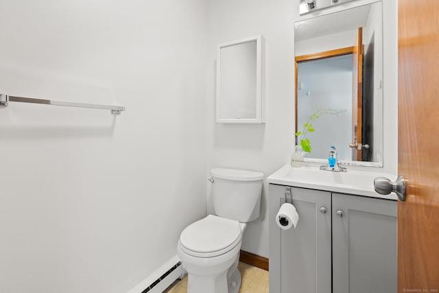 122 W Main St Apt E, Stafford, CT 06076 - half bathroom with baseboards, vanity, and toilet