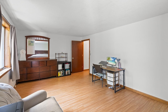 122 W Main St Apt E, Stafford, CT 06076 - office area featuring wood finished floors and baseboards