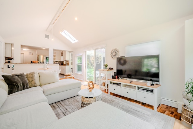 11 Walker Ln, Woodbridge, CT 06525 - living area with beam ceiling, wood finished floors, baseboard heating, and high vaulted ceiling