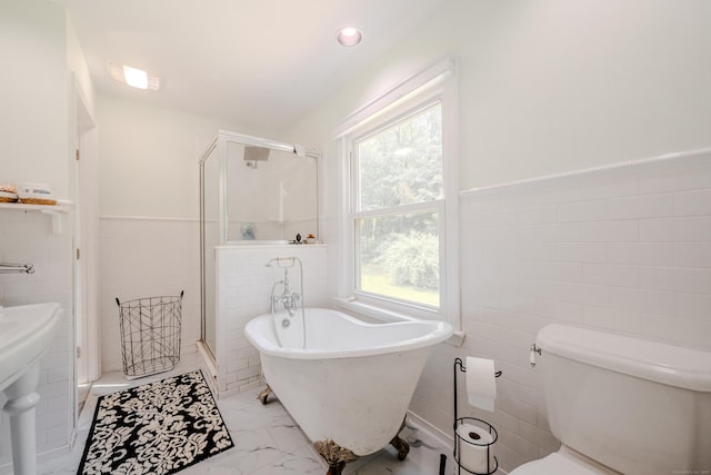 11 Walker Ln, Woodbridge, CT 06525 - full bath featuring tile walls, a freestanding bath, a shower stall, marble finish flooring, and a wainscoted wall