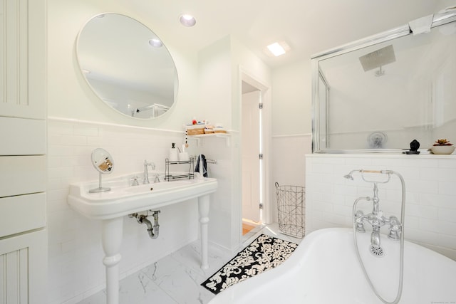 11 Walker Ln, Woodbridge, CT 06525 - bathroom featuring tile walls, a soaking tub, marble finish flooring, a wainscoted wall, and recessed lighting