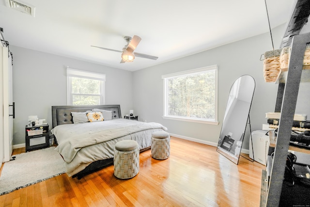 11 Walker Ln, Woodbridge, CT 06525 - bedroom with light wood-style floors, a ceiling fan, and baseboards