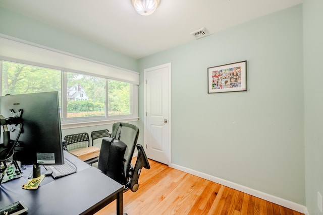 11 Walker Ln, Woodbridge, CT 06525 - home office with baseboards and light wood finished floors