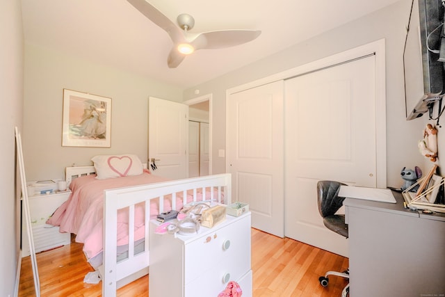 11 Walker Ln, Woodbridge, CT 06525 - bedroom with light wood-style floors, a closet, a desk, and ceiling fan