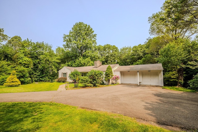 11 Walker Ln, Woodbridge, CT 06525 - view of front of home featuring a front lawn and a chimney
