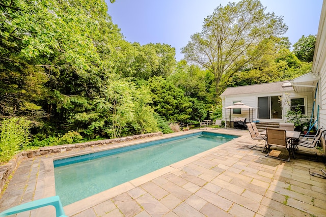 11 Walker Ln, Woodbridge, CT 06525 - outdoor pool with a patio and outdoor dining space