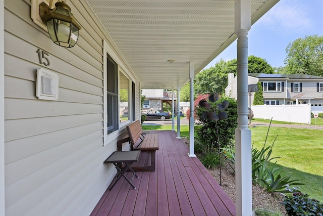 15 Oakledge Cir, Norwalk, CT 06854 - porch featuring a lawn